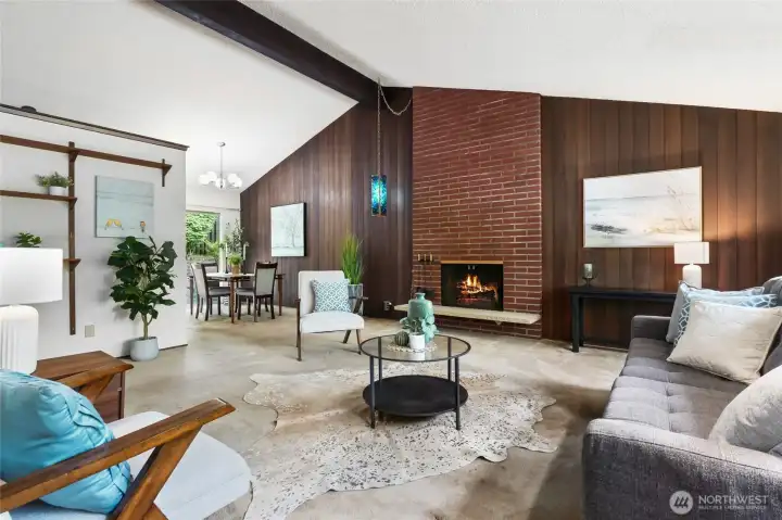 Soaring vaulted ceilings and towering brick fireplace. Soaring vaulted ceilings and towering brick fireplace.