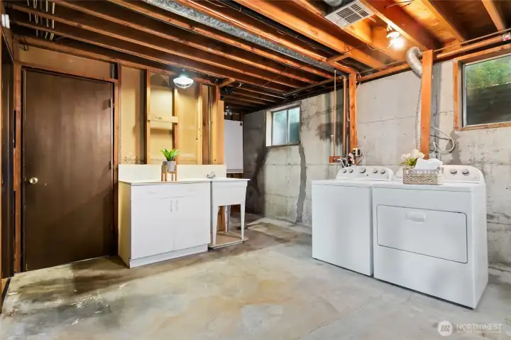 The basement has the washer and dryer hooked up with a laundry sink too. Original construction left stubbed in water and sewer connections for a future basement bathroom. The basement has the washer and dryer hooked up with a laundry sink too. Original construction left stubbed in water and sewer connections for a future basement bathroom.