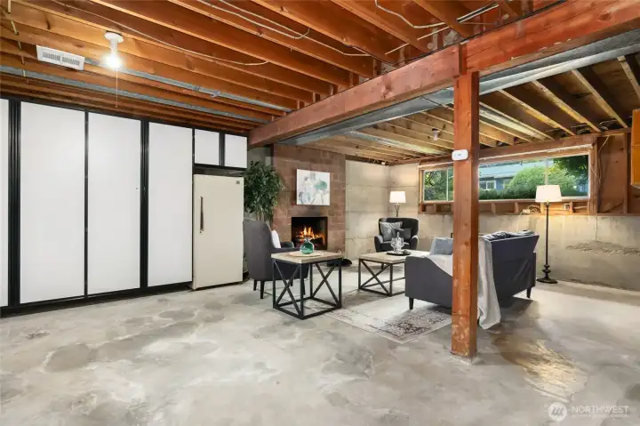 basement is mostly unfinished with a few built in storage cabinets. basement is mostly unfinished with a few built in storage cabinets.