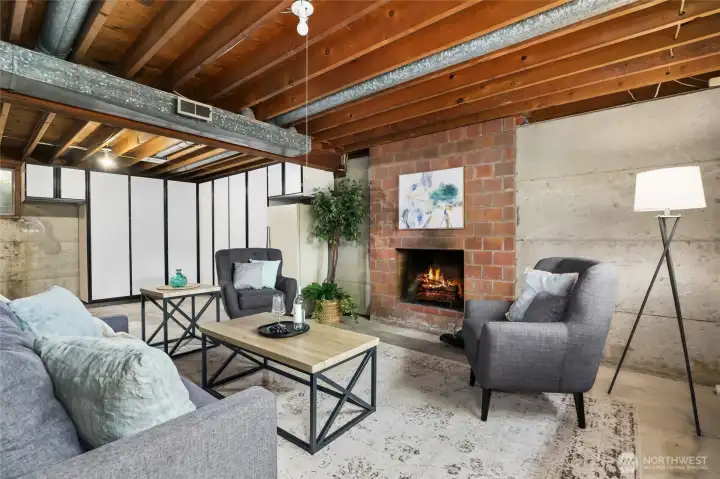 The basement does have a brick wood burning fireplace. The basement does have a brick wood burning fireplace.