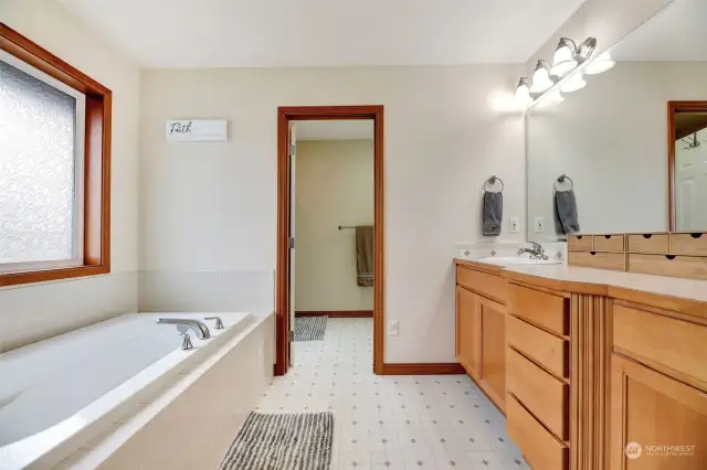 Primary bathroom, soaking tub and double vanity.