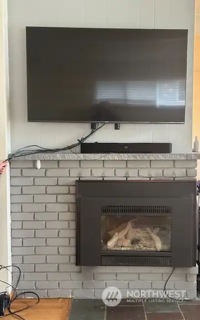 flat screen with natural gas fireplace
