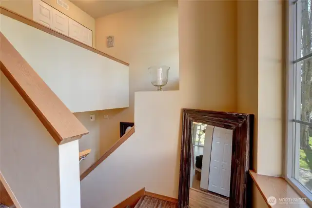Upstairs To Primary Suite & 2 Bedrooms...High Vaulted Ceilings