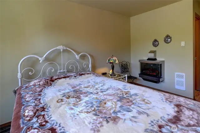 Electric Fireplace Adds To Primary Suite Ambiance