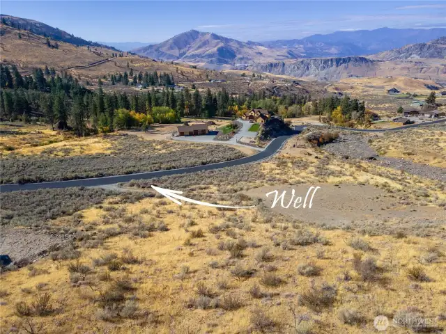 Shared well is located beside the current driveway.