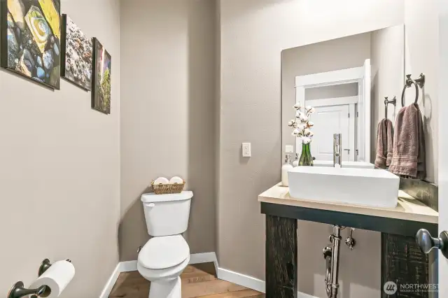 The rustic charm continues throughout even in the half bath downstairs!