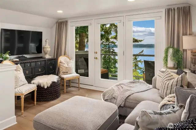 French doors lead from the TV area to the balcony.