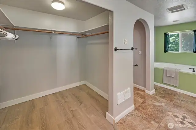 Walk-in closet off primary bedroom