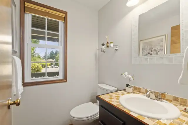 Handy half bath on the main level.