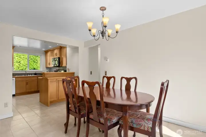 Dining room is adjacent to well-appointed kitchen--the heart of the home!