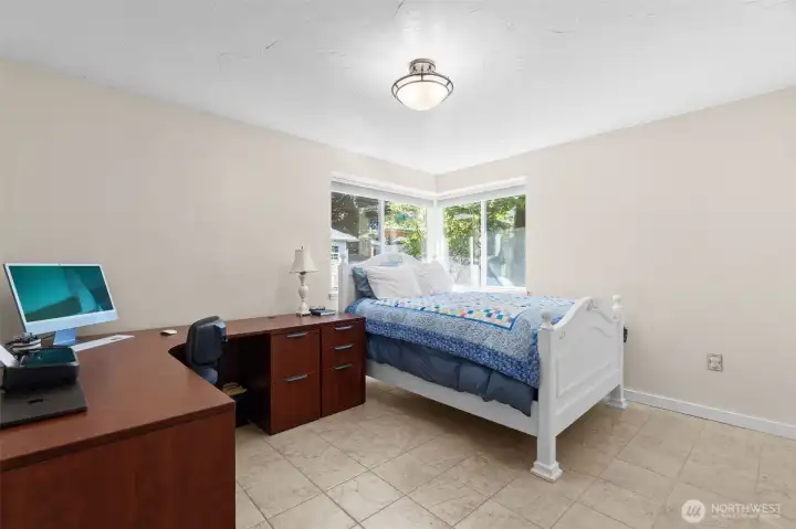 2nd bedroom also offers a lovely corner window view of the backyard, and is spacious as well.