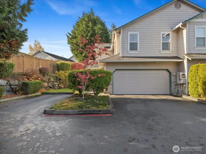 2 car garage & 2 car driveway. Guest parking to the left