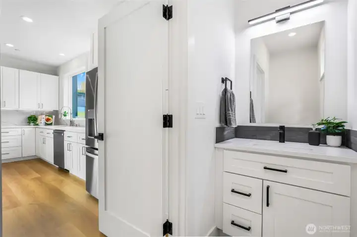 Half bathroom off of kitchen.