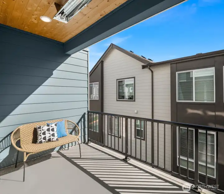 This covered, heated deck is perfect for your morning coffee, yoga and year-round entertaining!