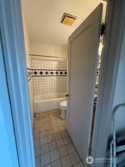 This is the main bathroom off the living room.  There is also a half bathroom at the other end of the home.