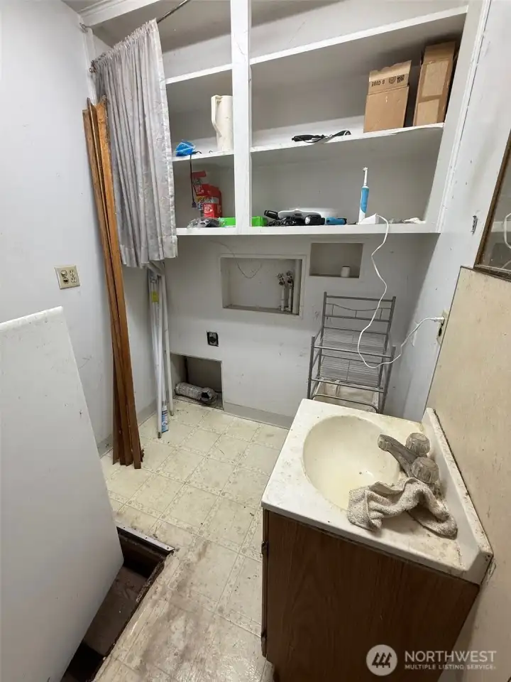 This is the laundry room space for a washer and dryer