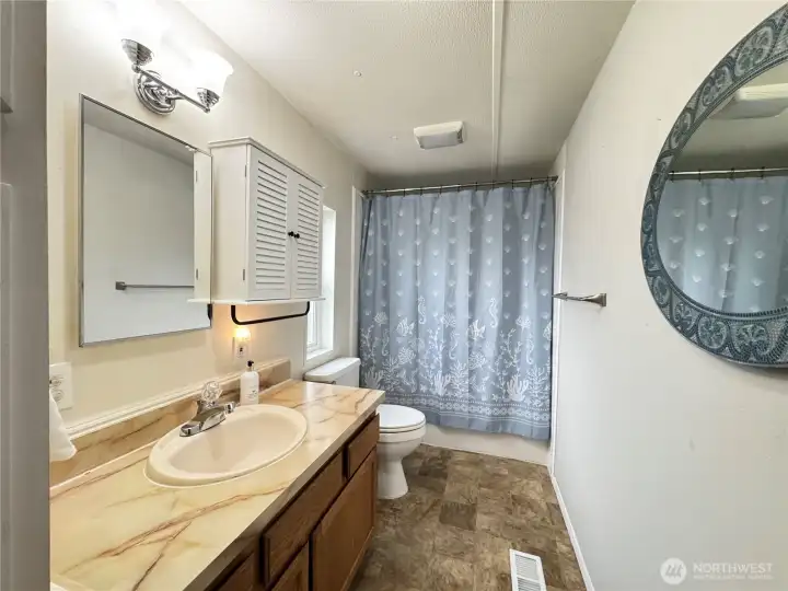 Primary bathroom with tub