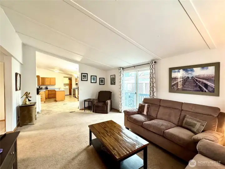 Back living room open to the kitchen