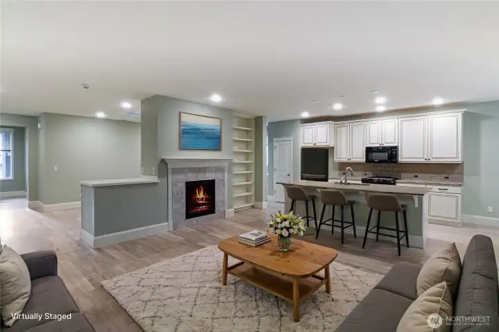 This Bainbridge floorplan offers open living space, complete with a gas fireplace and built-in shelves.