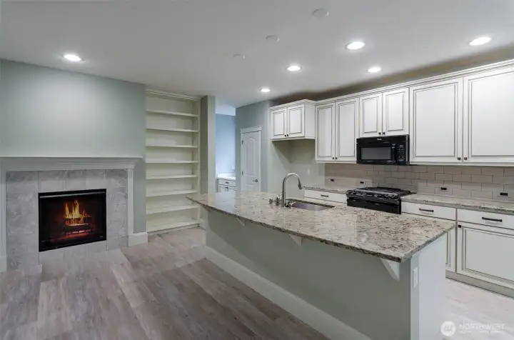 Massive storage in this kitchen.  Quartz counter tops and added bar seating.  Gas stove.