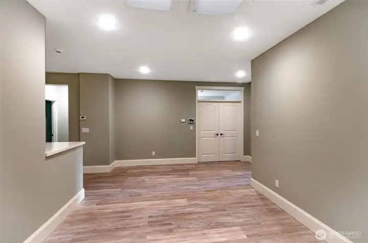 View of formal dining area looking back towards the den area.
