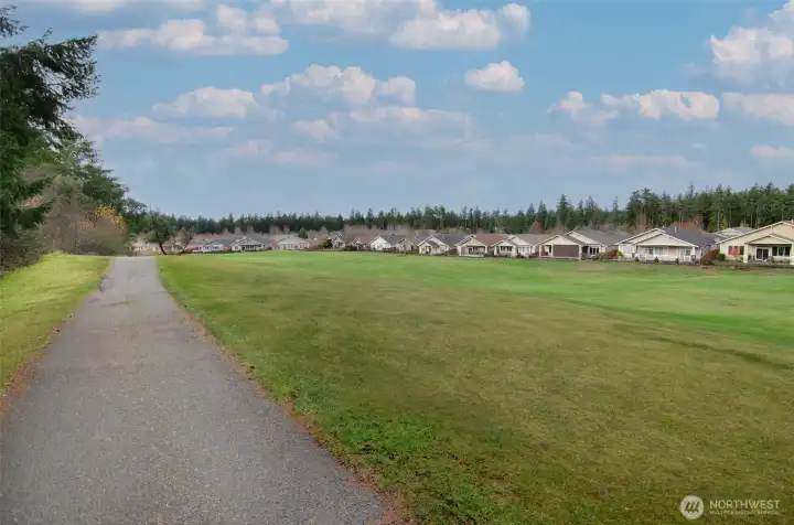 View looking the other direction from the golf cart path.