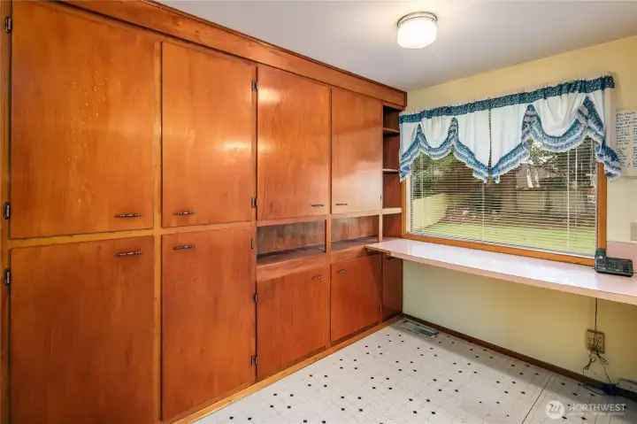 Extra cabinets built by owner for storage.