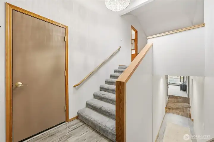 walk into this spacious split level entry way, with easy garage access to the left.