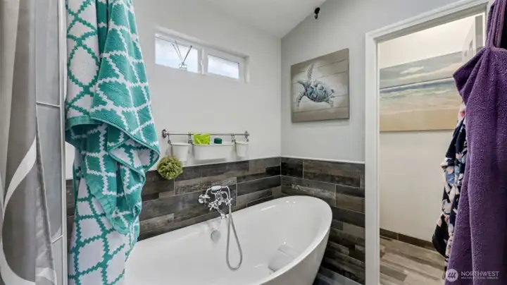 Relax in the freestanding soaking tub after a long day