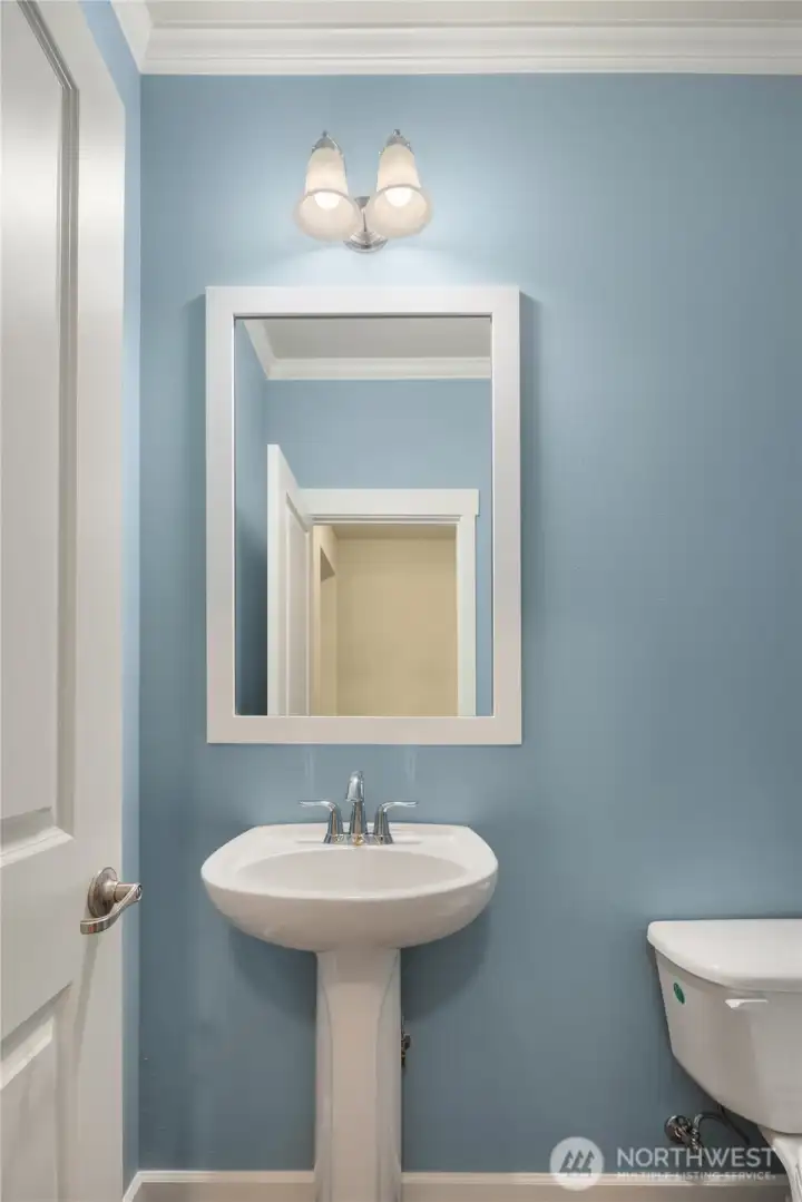 Half bath with pedestal sink.
