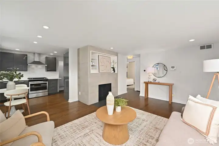 A peek into the modern kitchen and the hallway leading to the bedrooms.