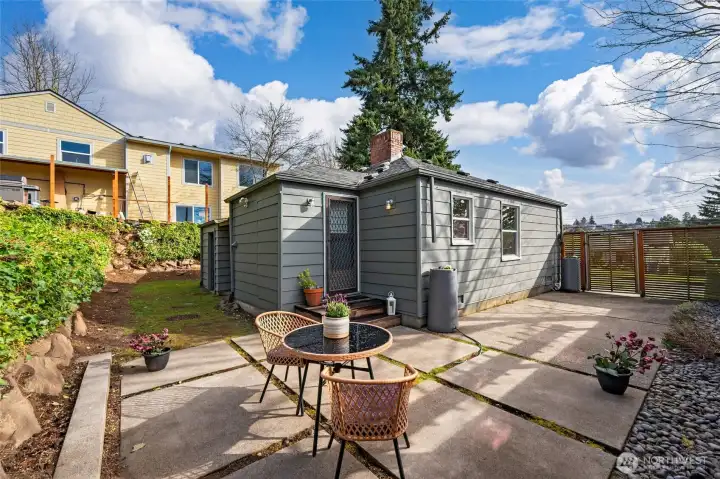 Sunny patio in the Western facing backyard! Fully fenced.