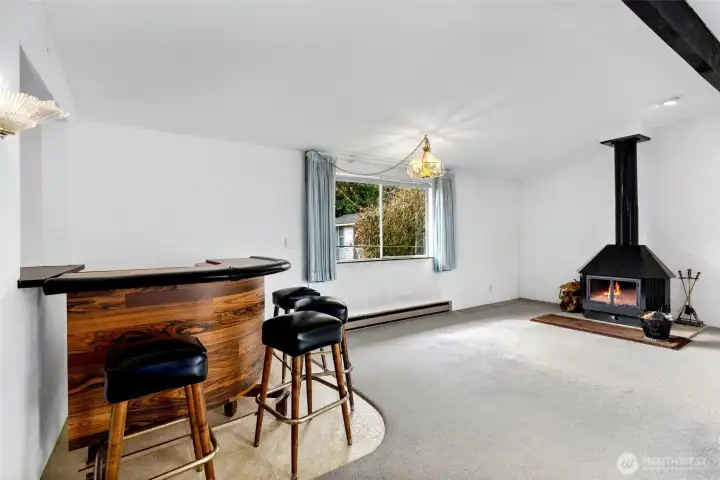 Huge bonus room with wood stove. Great for get togethers.