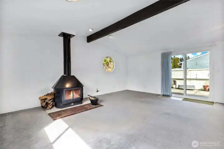 Flexible space, previously used as a rec room and dining room.