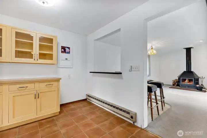 Built in buffet and kitchen eating space.