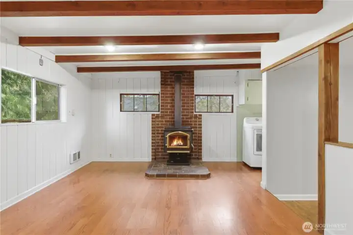 The kitchen features an open layout that flows easily into the dining area, creating a comfortable and connected space for everyday living.
