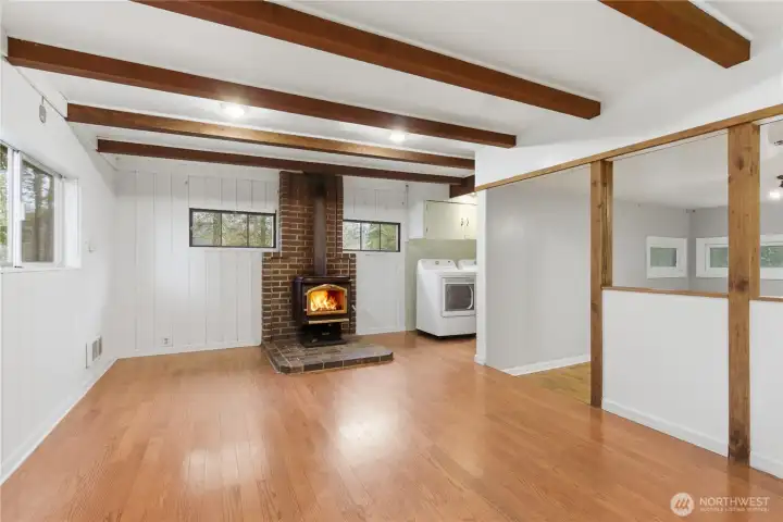 This view shows the natural flow from the dining area to the nearby laundry space, making everyday tasks easy and convenient.