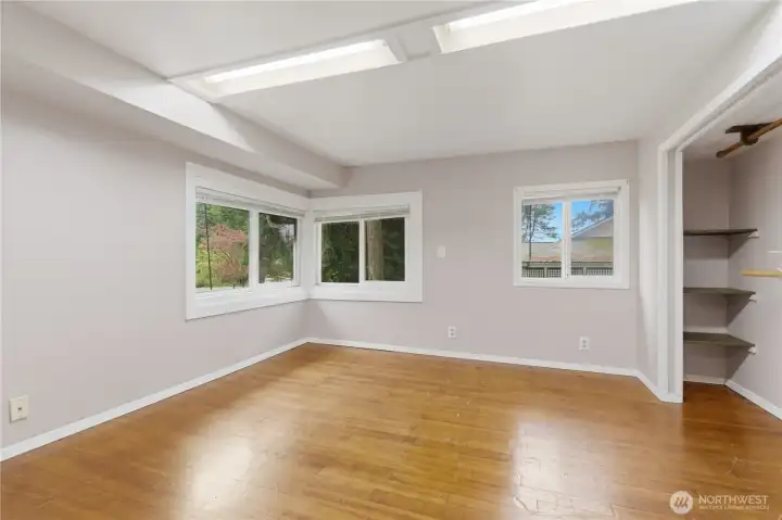This view highlights the hardwood floors that run throughout the home, offering a clean, low-maintenance surface that can be a great option for those with allergies.