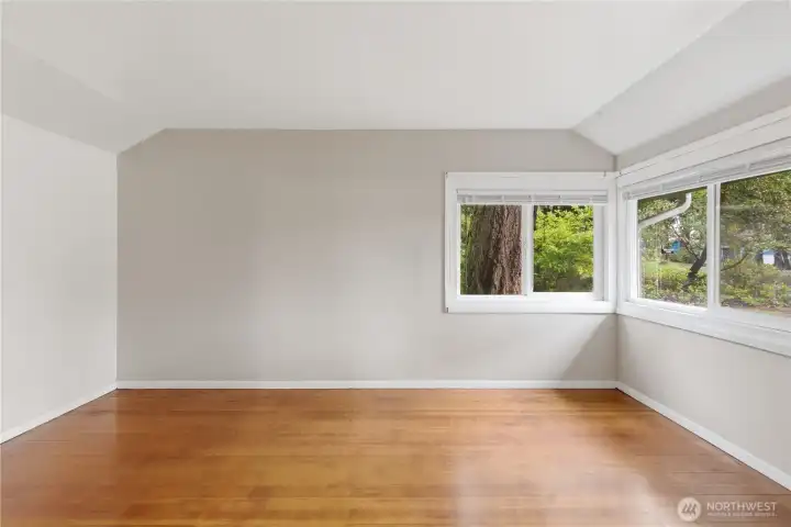 The second of two bedrooms offers a bright and comfortable space, with nice windows that bring in an abundance of natural light. It’s a welcoming room that works well as a guest space, home office, or additional bedroom.