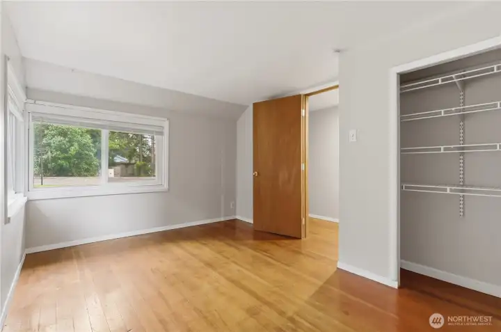 Another view of the second bedroom highlights its comfortable layout and natural light, offering a bright and versatile space ready to fit your needs.