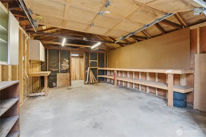 The one-car garage features built-in shelving, offering convenient storage for tools, seasonal items, and everyday essentials. It’s a practical space that helps keep everything organized and within easy reach.