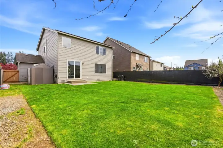 Level yard w/ plenty of space for fun, gardening and more!