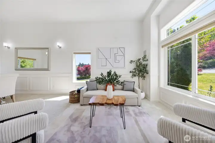 Formal living room with new carpet and wainscoting.