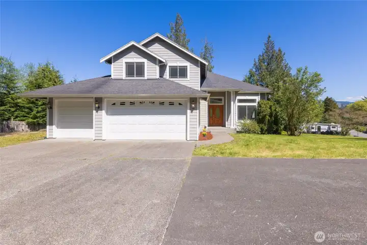 Huge driveway at the front of the home.