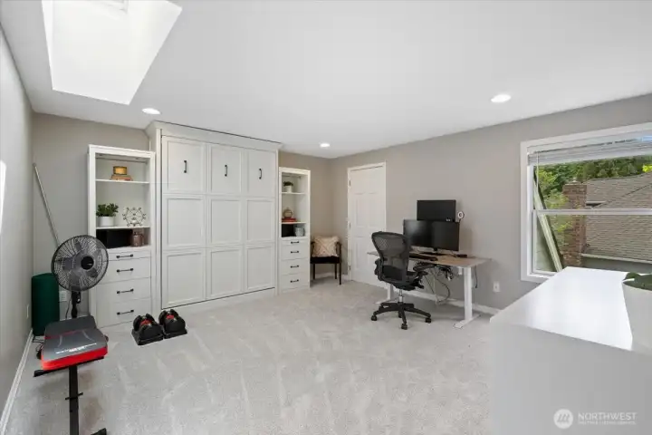 Den/Office/5th Bedroom with a Murphy bed that conveys with the property.