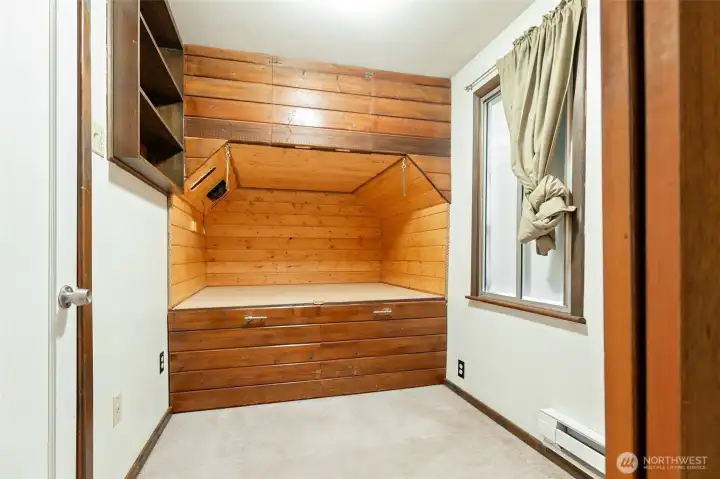 Primary Bedroom with storage above and below the bed