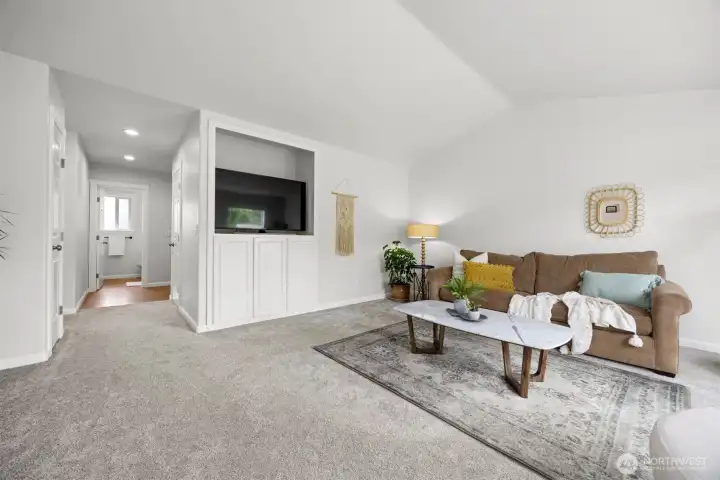 Inside, vaulted ceilings and abundant natural light create an open, airy feel. Inside, vaulted ceilings and abundant natural light create an open, airy feel.
