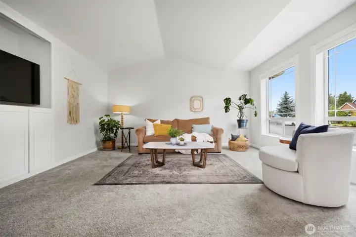 The spacious living room offers additional space to gather, relax, and spend the perfect night in. The spacious living room offers additional space to gather, relax, and spend the perfect night in.