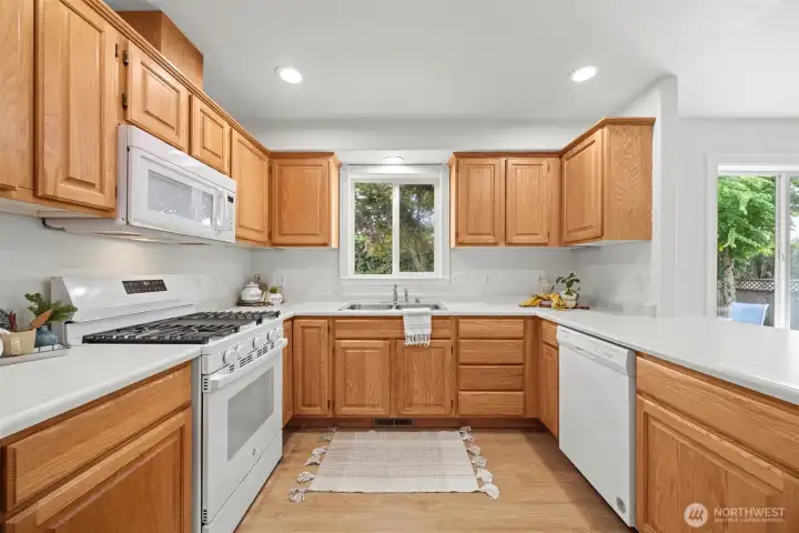 You'll love the way the kitchen looks out into the fully fenced yard, with room for pets, gardening, or simply enjoying the outdoors. You'll love the way the kitchen looks out into the fully fenced yard, with room for pets, gardening, or simply enjoying the outdoors.