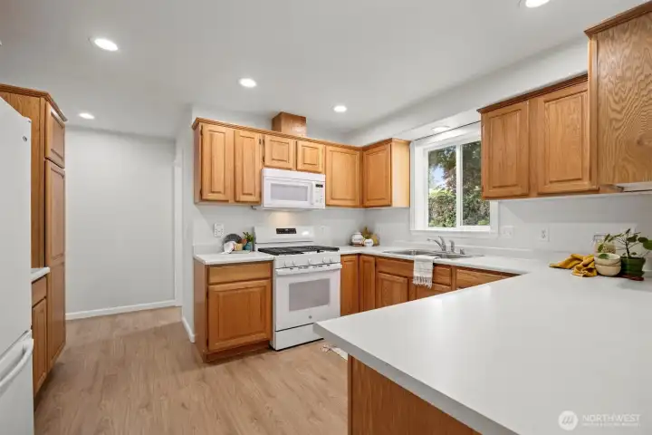 The kitchen has a new (2026) stove, great storage, and abundant counterspace for prep work. The kitchen has a new (2026) stove, great storage, and abundant counterspace for prep work.